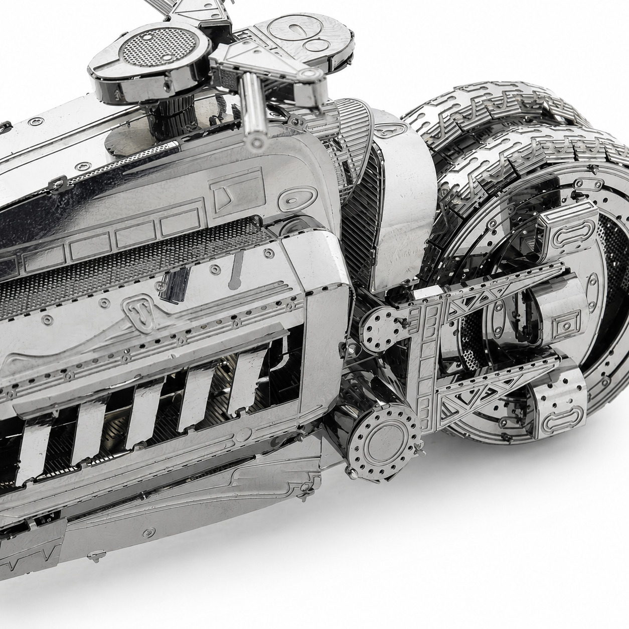 Metallic mechanical motorcycle model showcasing intricate details