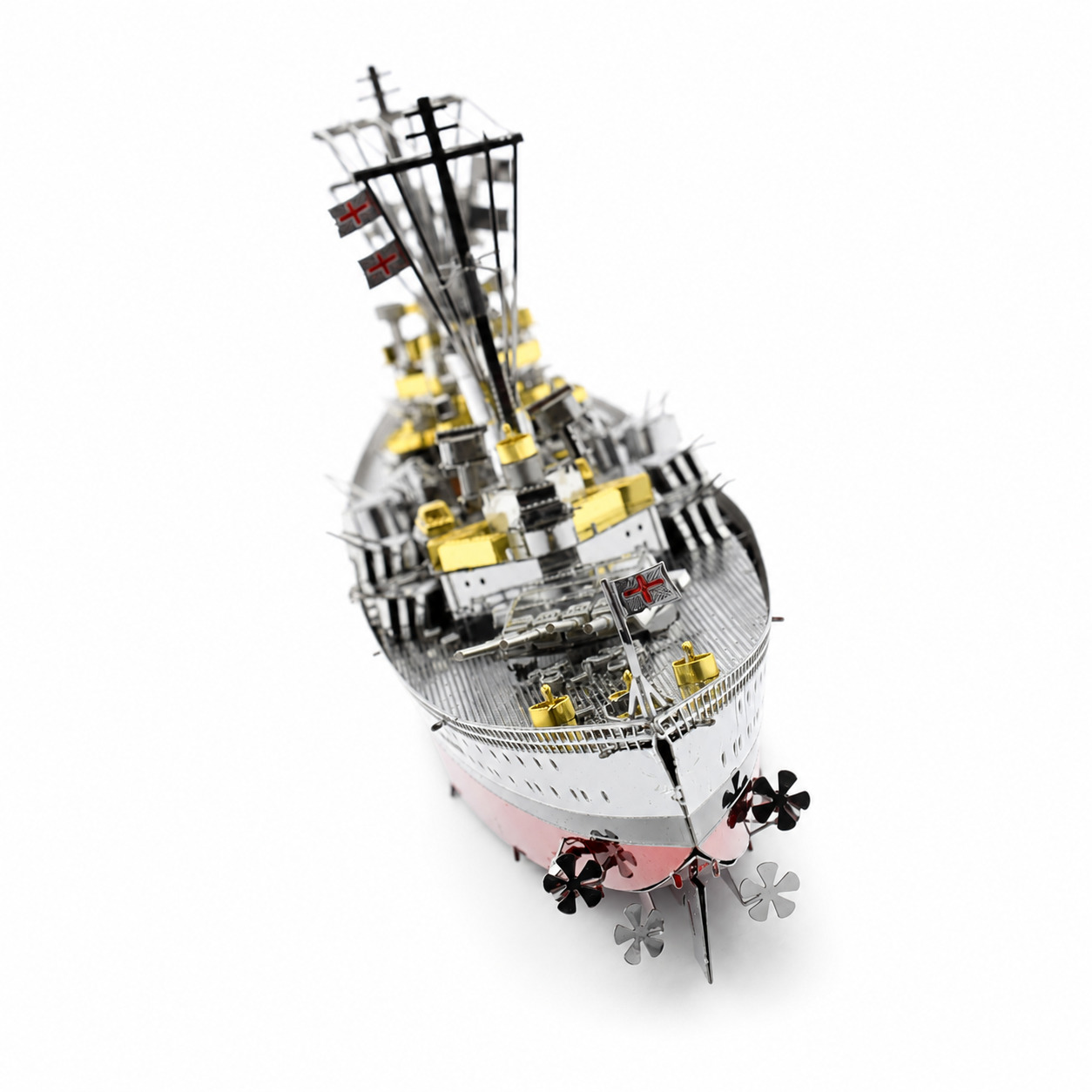 Detailed model of a historic ship with flags and intricate designs