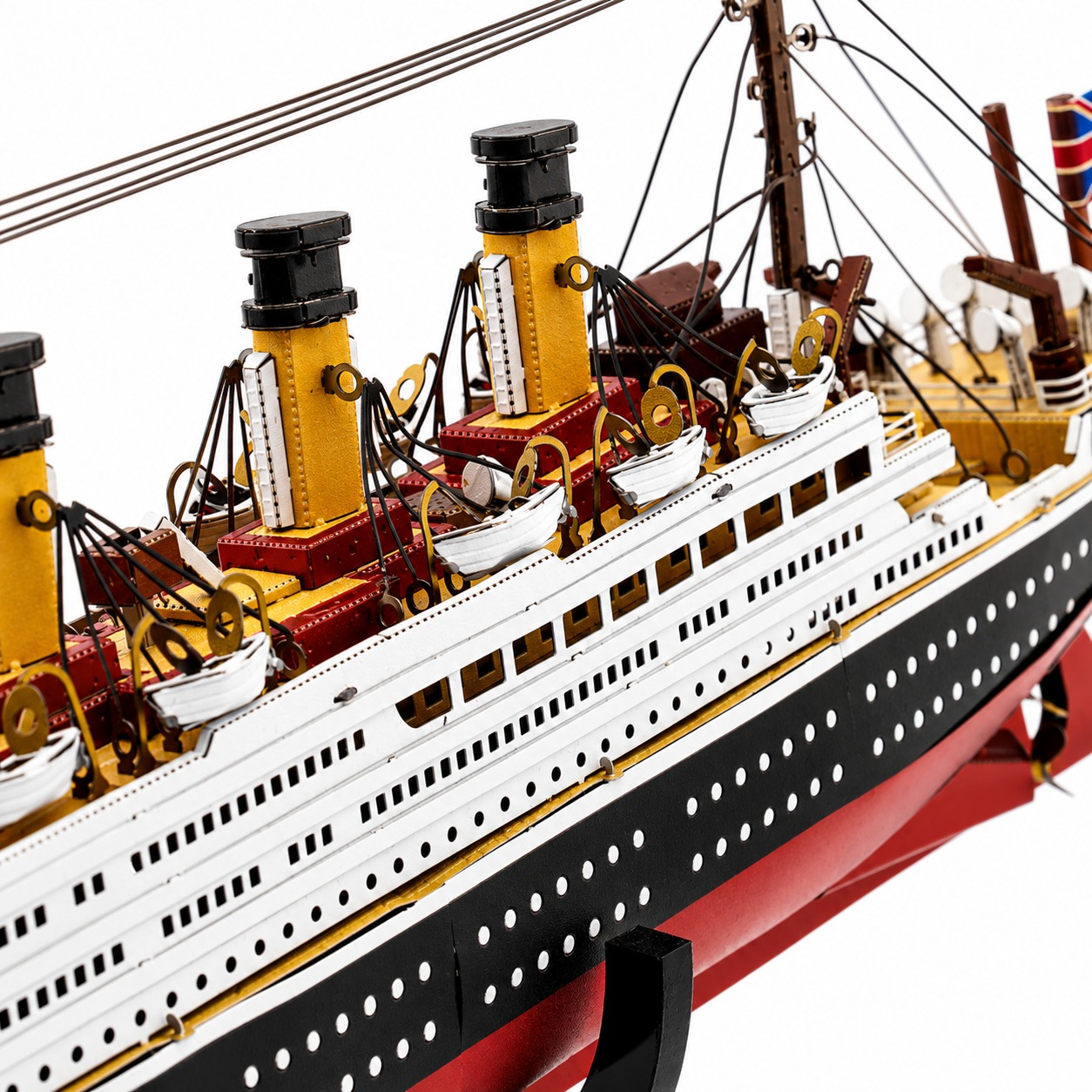Colorful model of a ship with detailed smokestacks and lifeboats