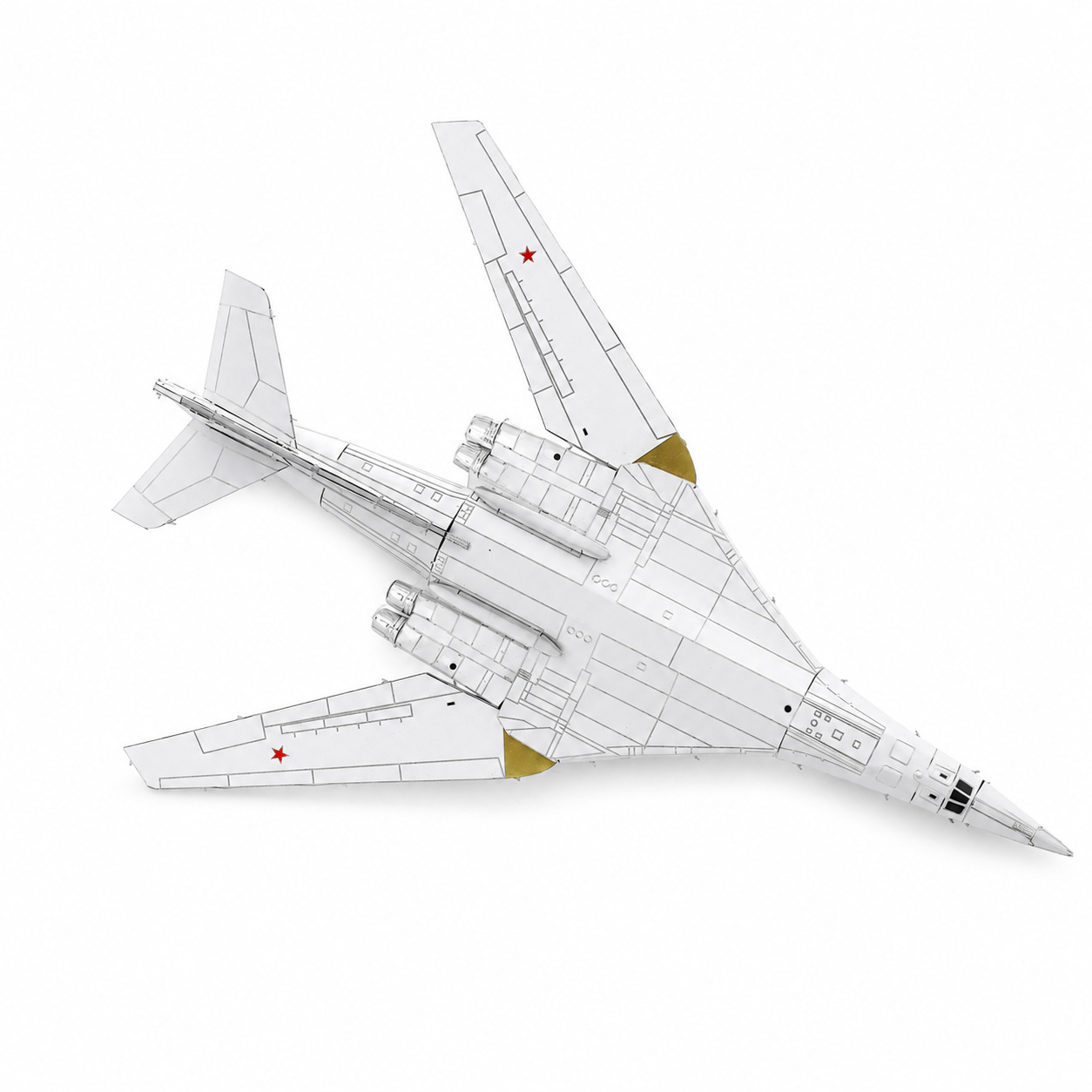 A top-down view of a sleek, white aircraft model with red stars.