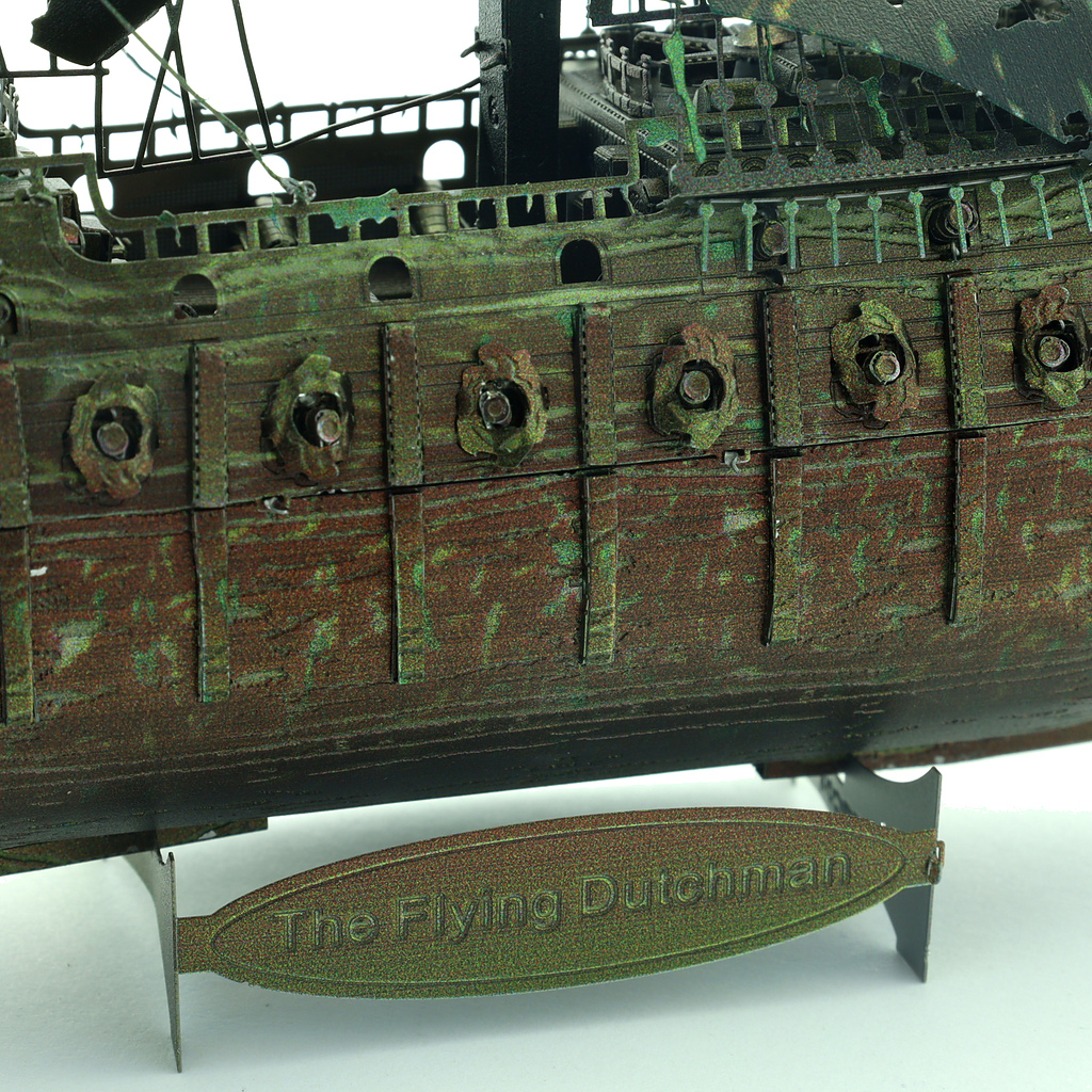 Detailed view of the Flying Dutchman model hull, showcasing intricate textures and design.