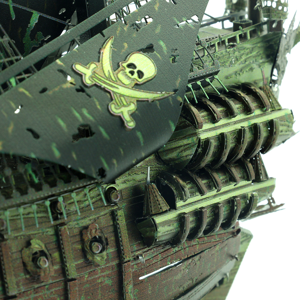 Detailed view of a ship's stern with a skull and crossbones flag