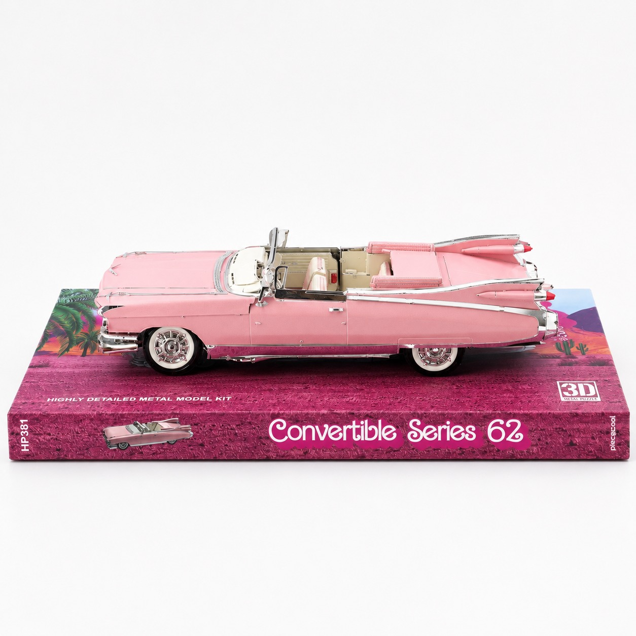 Detailed model of a pink convertible car on its packaging